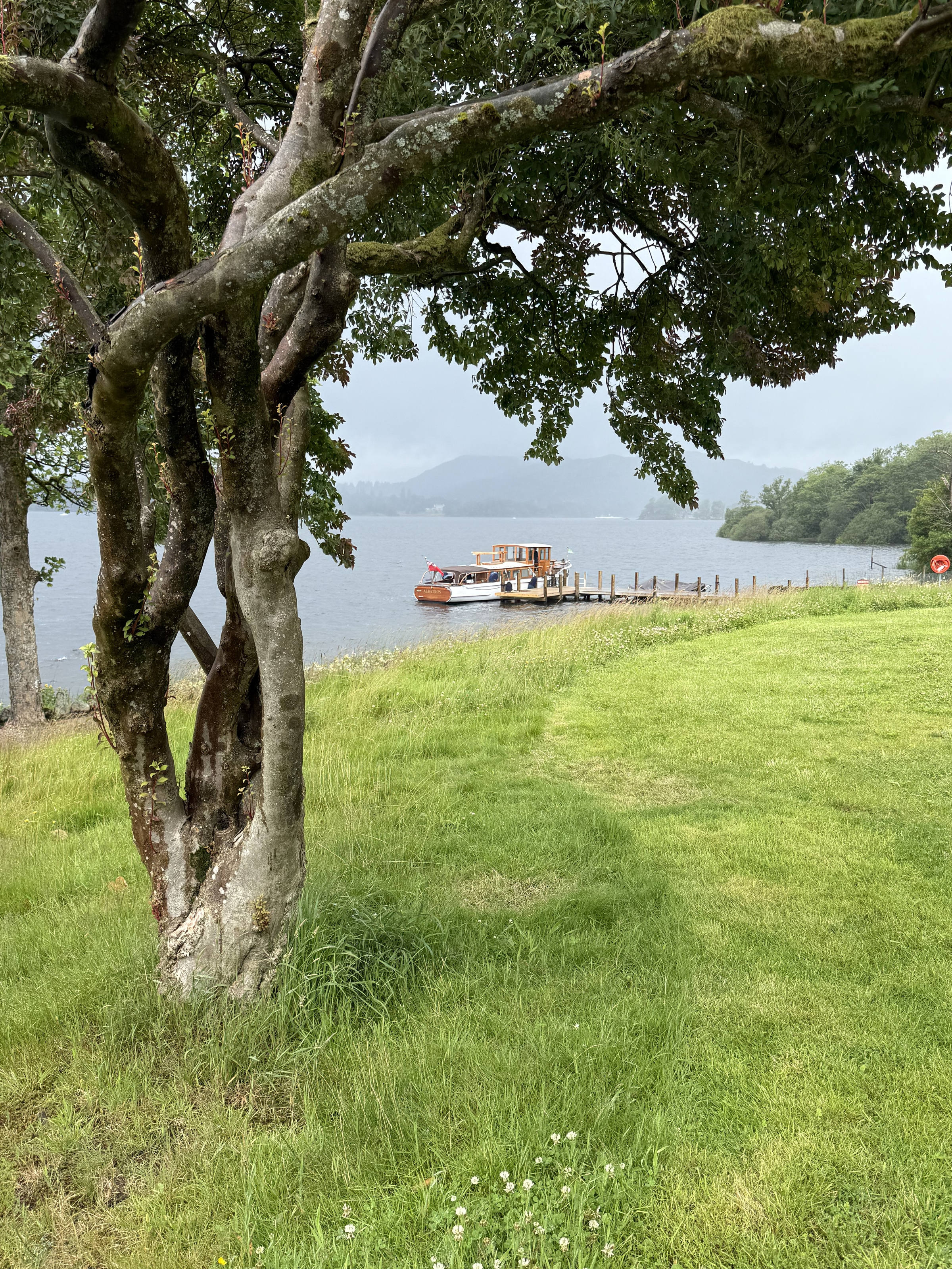 Vintage boat moored on Lake Windermere at Langdale Chase