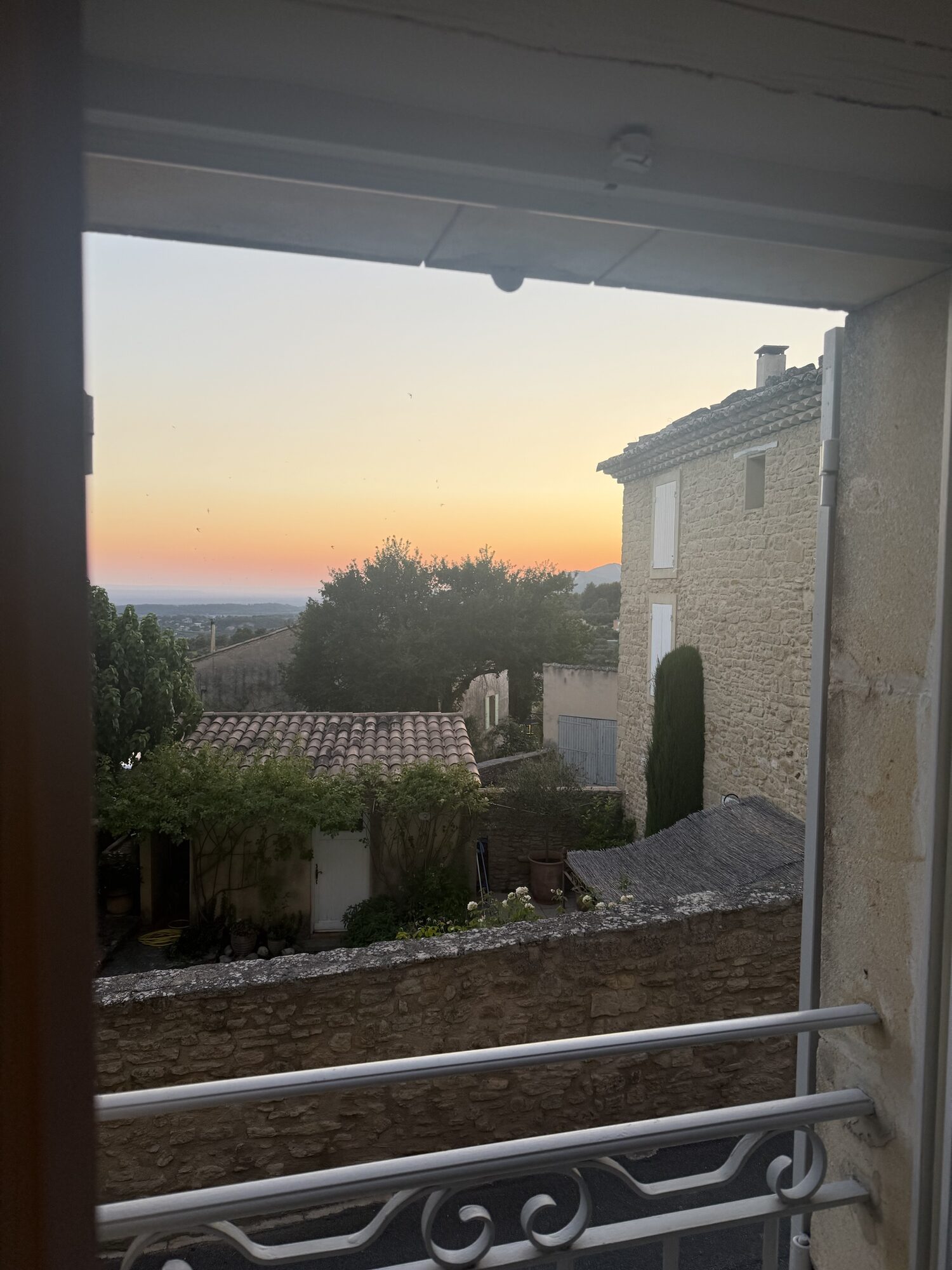 Sunset over the valley from a window at Crillon le Brave